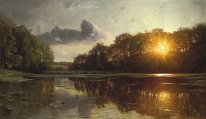 Sunset over a forest lake